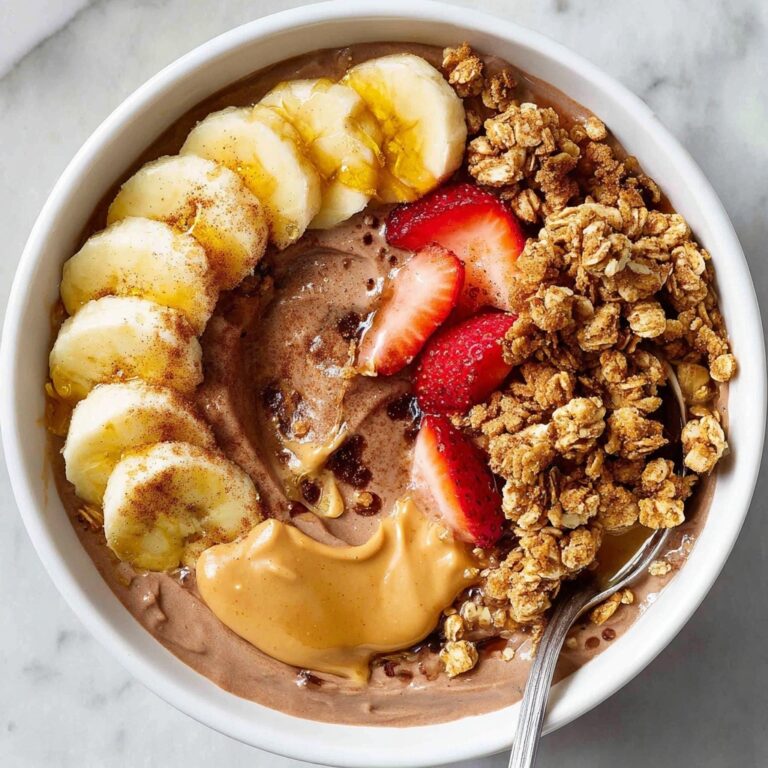 Chocolate Protein Yogurt Bowl with Peanut Butter and Toppings Recipe