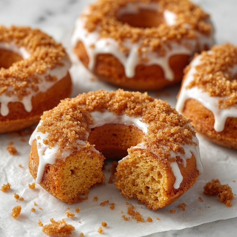 Delicious Coffee Cake Donuts with Crumb Topping and Vanilla Glaze Recipe