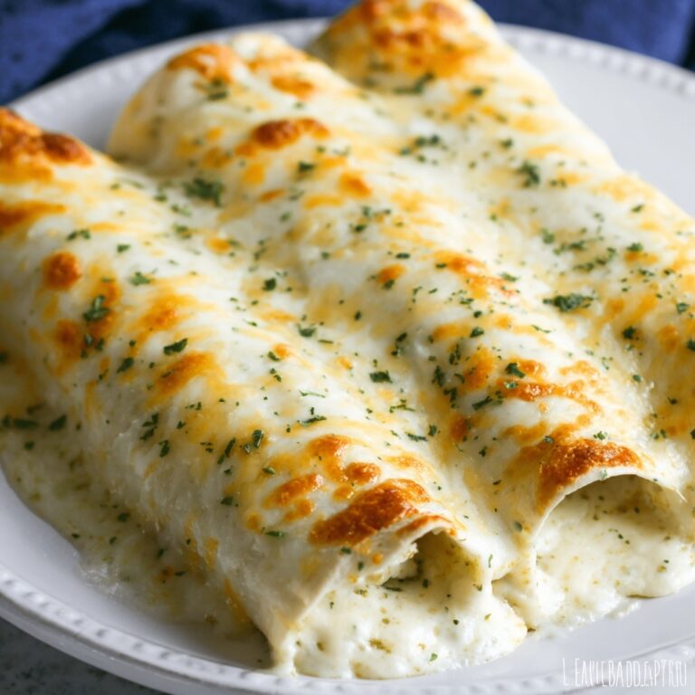 Creamy Green Chili Chicken Enchiladas with Sour Cream Sauce Recipe