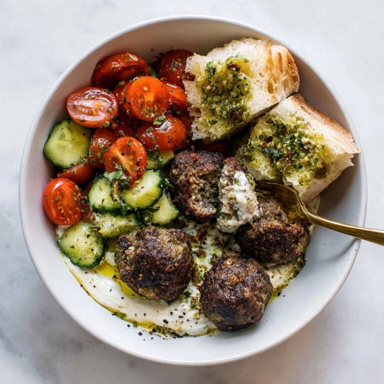 Sheet Pan Meatballs with Tomato Salad and Green Sauce Recipe